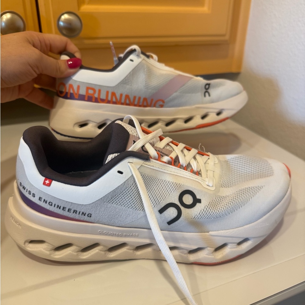 On Running White and Gray Sneakers with Black Accents